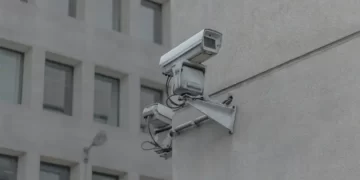 a cctv camera on the side of a building