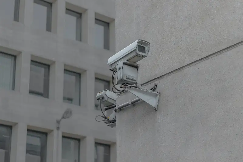 a cctv camera on the side of a building