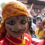 child from india at a local parade