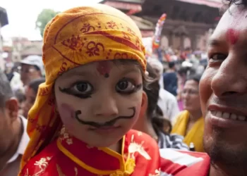 child from india at a local parade