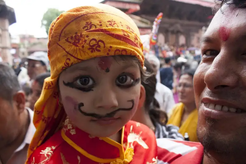 child from india at a local parade