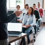 everyone-is-smiling-listens-group-people-business-conference-modern-classroom-daytime