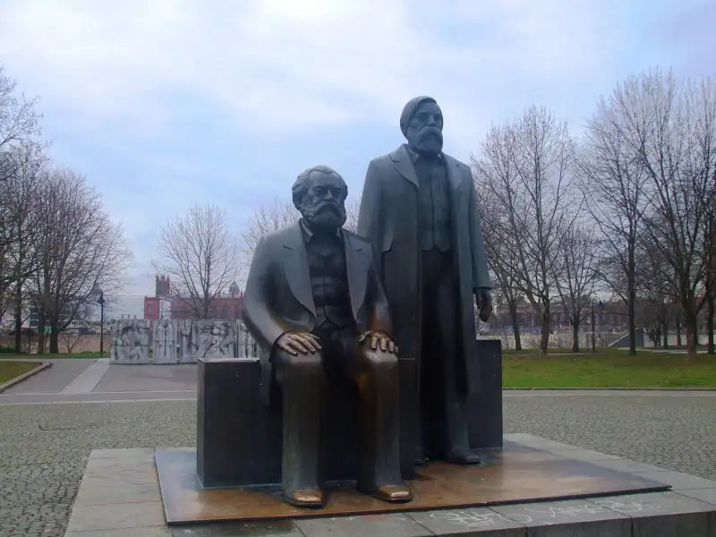 A statue of karl marx and freiedrich engels