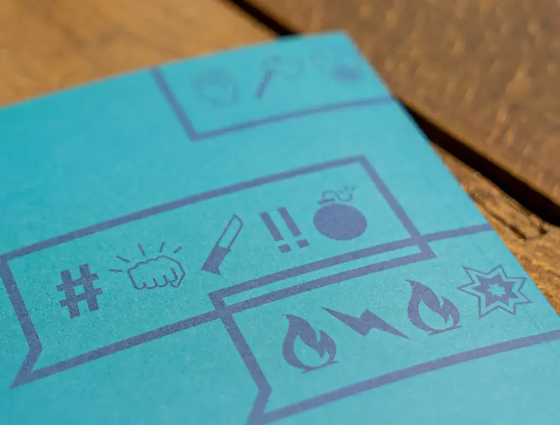 Random set of symbols on turquoise paper