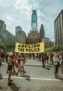 A protest sign demanding the abolition of the police