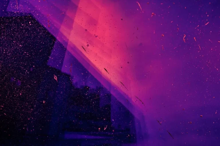 Artistic abstract image in various hues of purples, blue and black