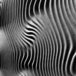 an abstract image of grey wavey patterns