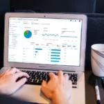 A laptop with a graph analysis