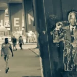 A graffitti image on a wall depicting Nelson Mandela the anti-apartheid campaigner
