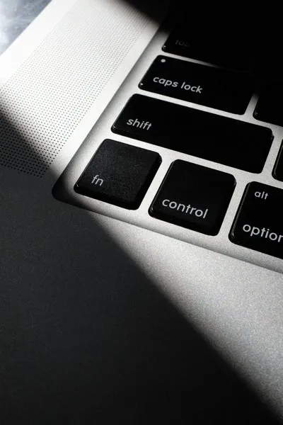 A laptop control button on the keyboard