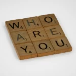9 squares in rows of 3 which read 'who are you' - identity