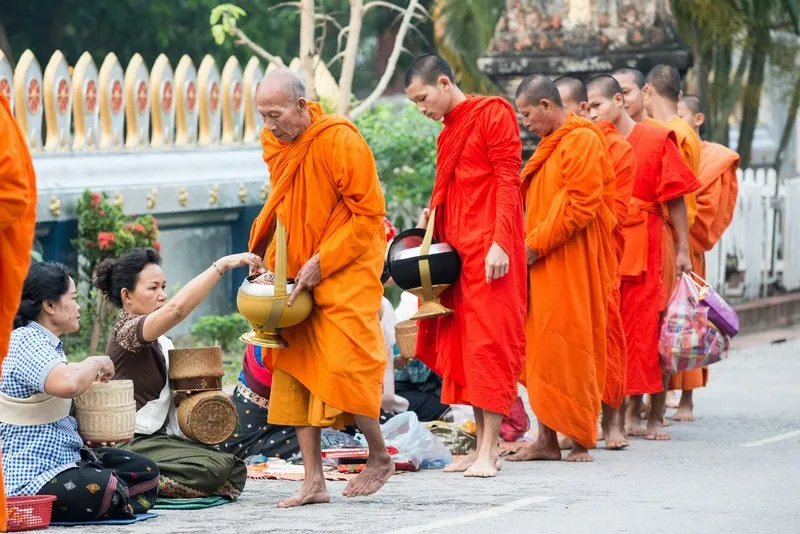 A line of Buddhist monks in buddhism