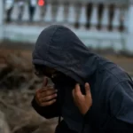 A man wearing a hoodie