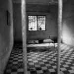 A prison cell in black and white