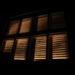 a dark shot of some window shutters