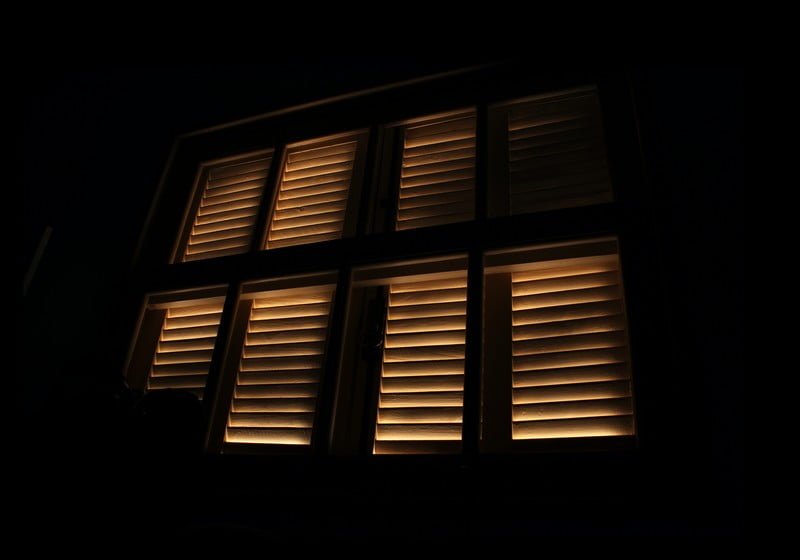 a dark shot of some window shutters
