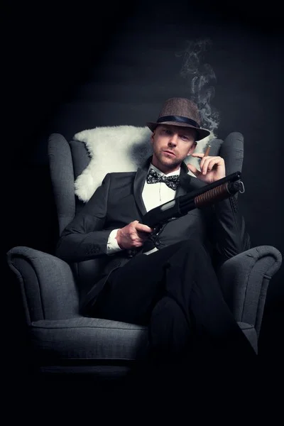 A corporate crime gangster in the back of car with a cigar