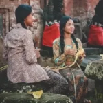 two women in cultural relative surrounds