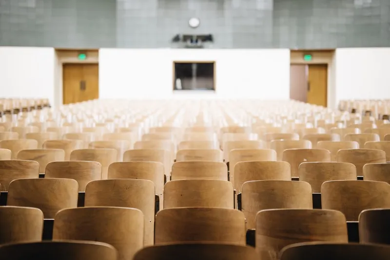 an empty lecture theatre - education privatisation