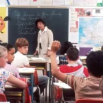 A group of schoolchildren in a classroom - academisation