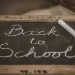 An education chalk board stating 'back to school'