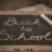 An education chalk board stating 'back to school'