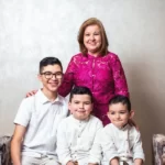 A mother and three differently aged children - age sets
