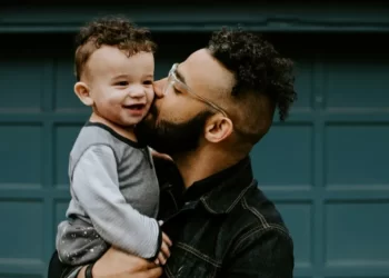 A man holding his son