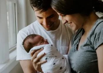 new parents bonding with their baby