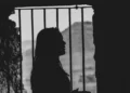 silhouette of female prisoner - crime and deviance