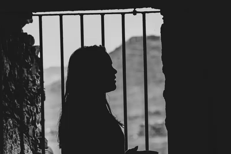 silhouette of female prisoner - crime and deviance