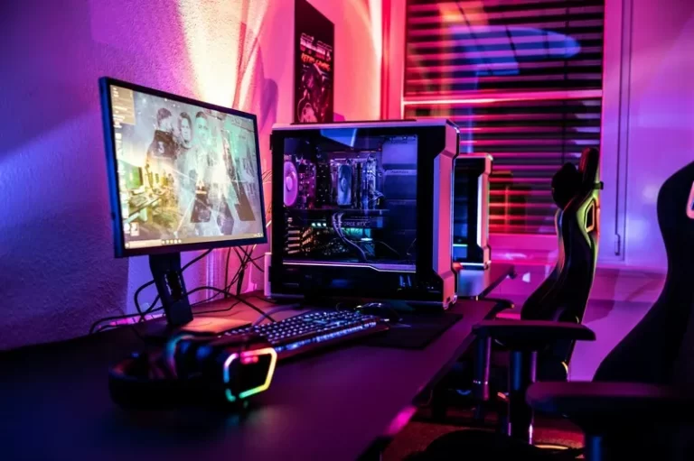 A PC with a video game displayed on screen