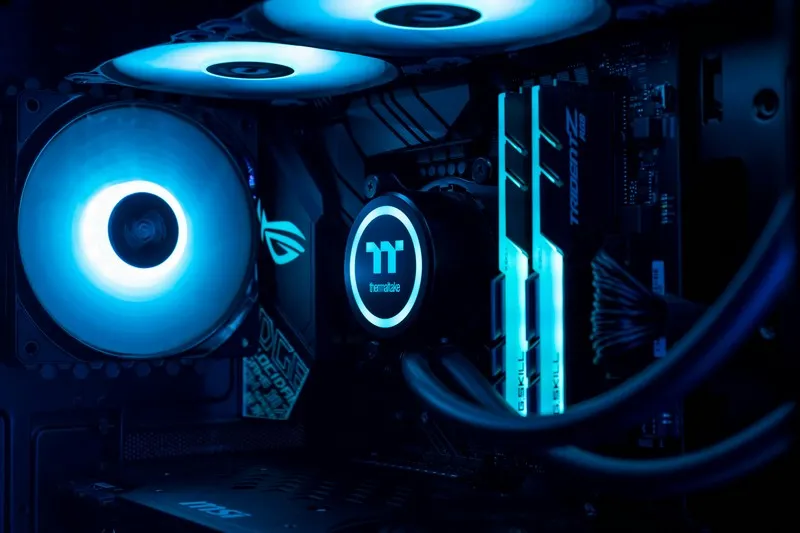 The inside of a pc lit up in blue
