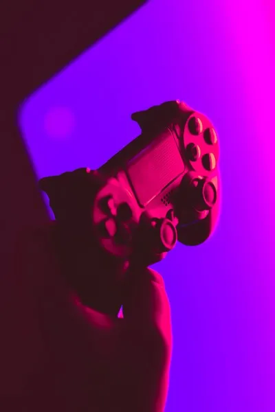 A neon styled image of a playstation controller