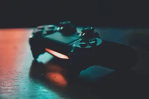 A playstation 4 controller in shaded light