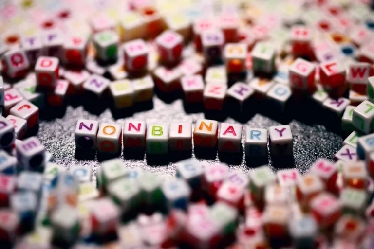 some colourful square beads which denote the gender 'non-binary'