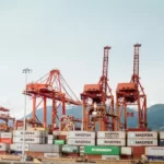 A row of shipping cranes in a port