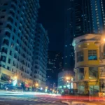 a globalised city at night with light trails