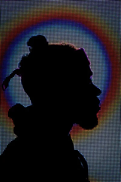 A silhoutted person in profile head shot individualisation