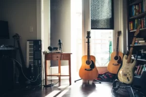 a collection of instruments in a shaded room
