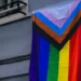 LGBT flag hanging from a window