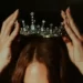 A woman adorning a crown - ascribed status