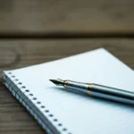 A notebook and pen for law legislation contract legal