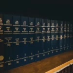 a row of conventional books in uniformed order