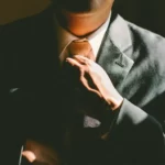 A bureaucrat in a suit ready for bureaucracy