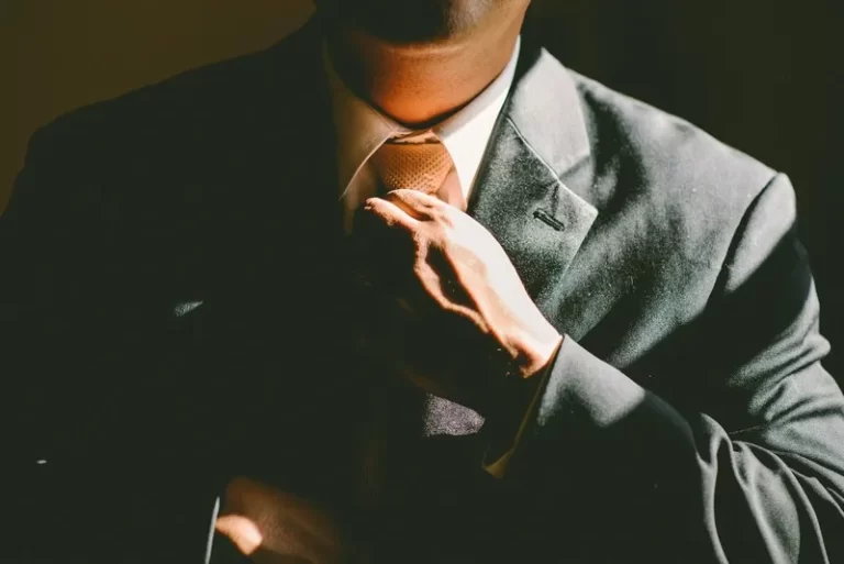 A bureaucrat in a suit ready for bureaucracy