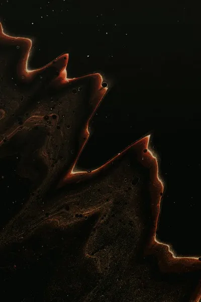 An abstract liquid in black and brown