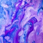 An abstract liquid art with swirling hues of pink, blue, and purple