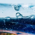 An abstract image of liquid in various shades of blue