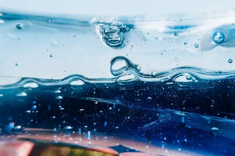 An abstract image of liquid in various shades of blue